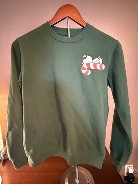 Peanuts Green Sweatshirt with Snoopy Candy Cane Graphic